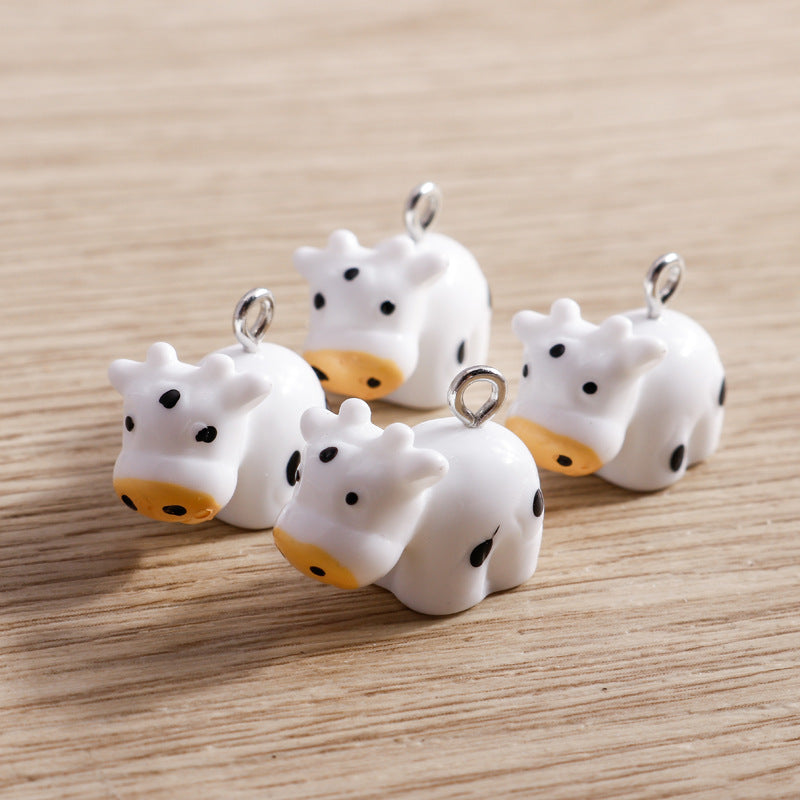 Wholesale 10 PCS/PACK of Cartoon Cow Resin Accessories DIY Keychain Jewelry Pendant